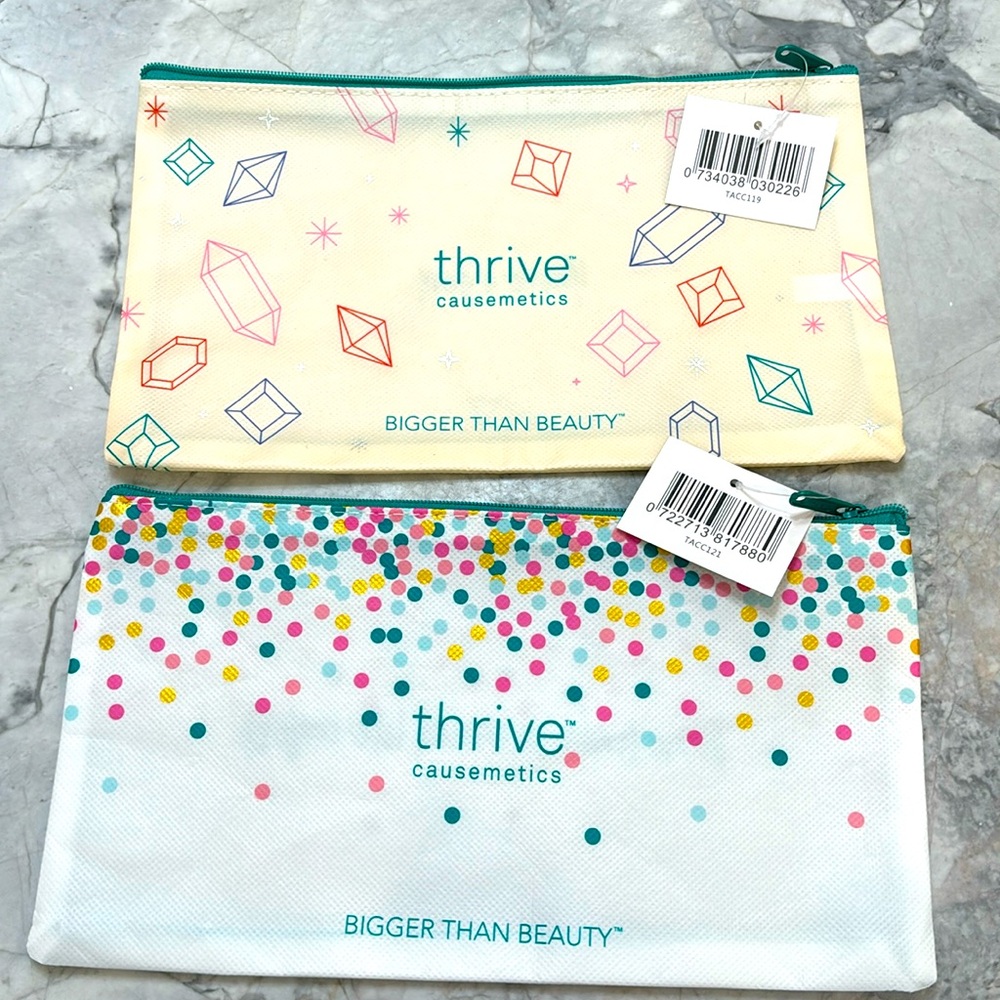 NWT Thrive causemetics zip pouches set of 2